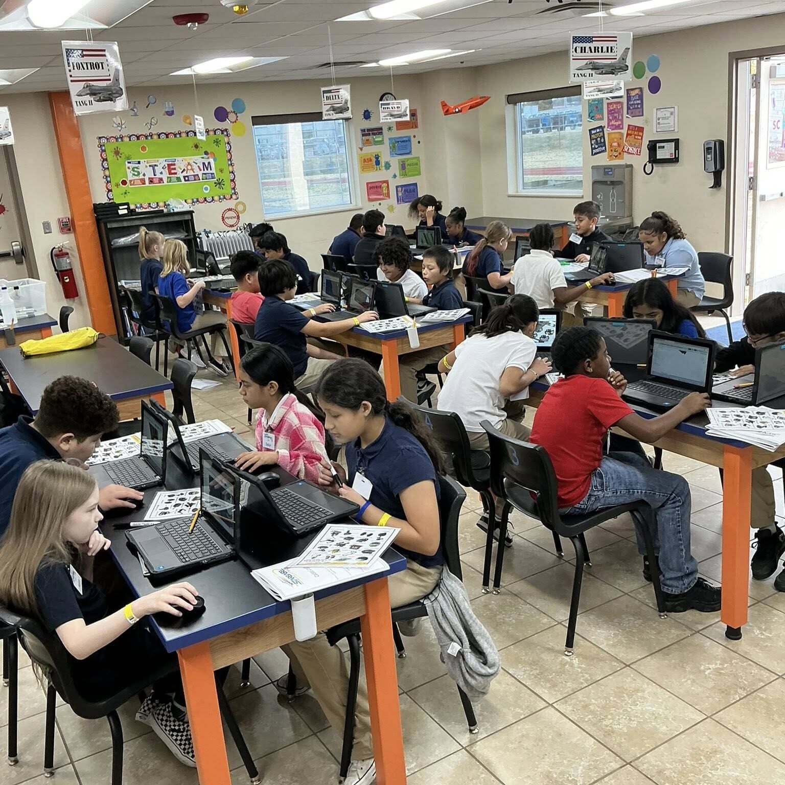 Starbase Tulsa Academy - Group of Students at a computer